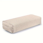 Large rectangular yoga bolster pillows in pink, grey, and purple colors, with an image demonstrating usage in restorative yoga meditation.